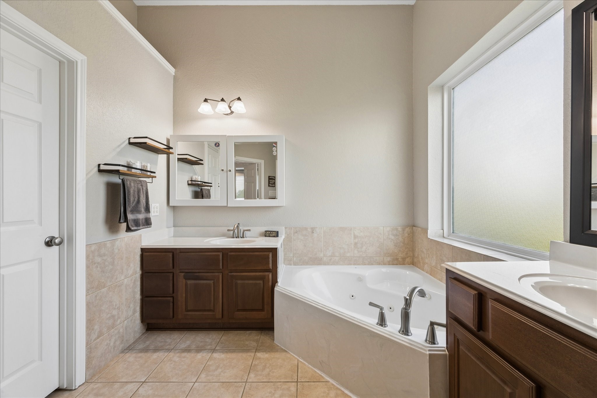 2702 Horseshoe Lane Rosharon, TX 77583 - Photo 26 of 43 Spacious primary bath provides generous storage and a functional layout for everyday living.