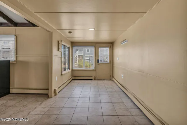 a view of a room with a windows