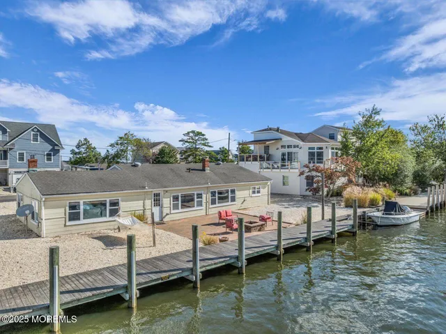 a view of houses with swimming pool