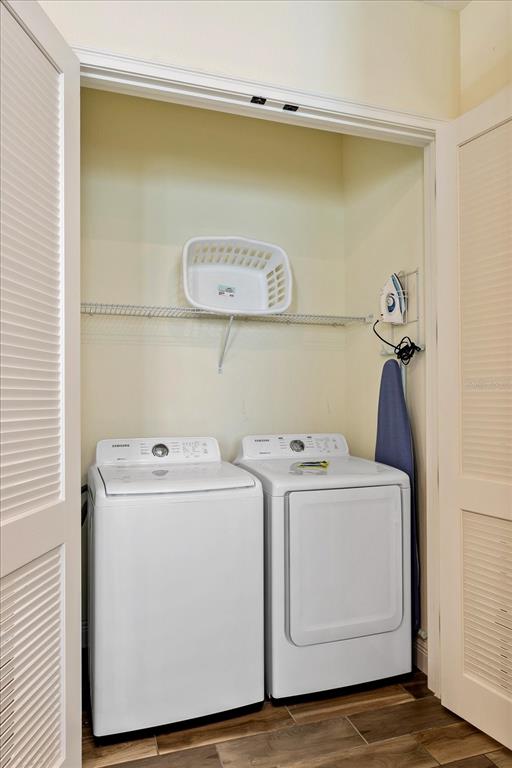 8063 Knee Deep Road Kissimmee, FL 34747 - Photo 20 of 24 a utility room with dryer and washer