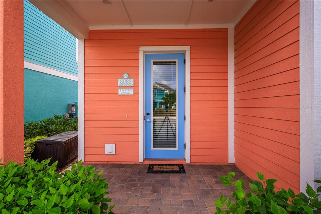 8063 Knee Deep Road Kissimmee, FL 34747 - Photo 2 of 24 a front view of a house with a yard