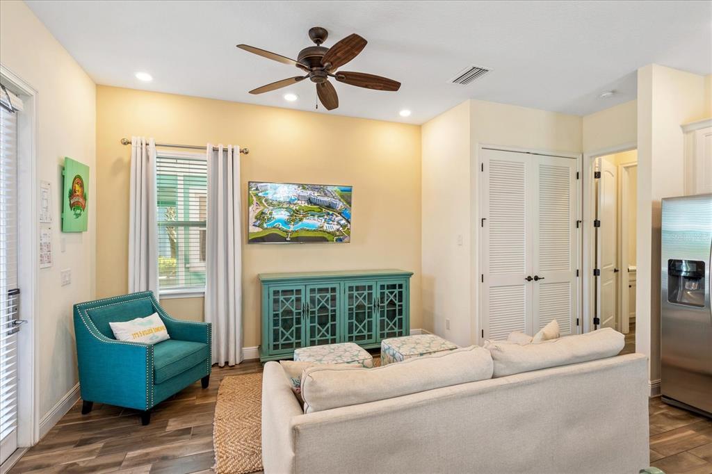 8063 Knee Deep Road Kissimmee, FL 34747 - Photo 4 of 24 a living room with furniture and a window
