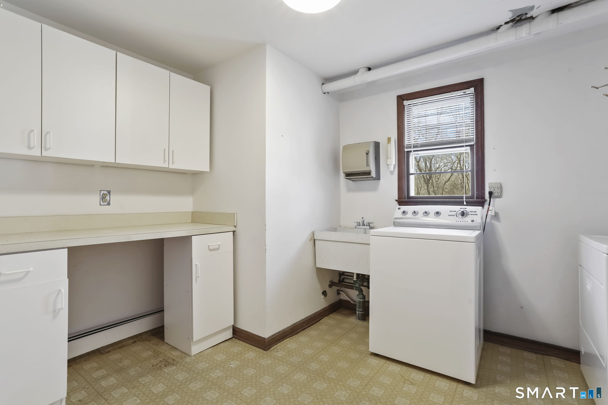 34 Jockey Hollow Road Monroe, CT 06468 - Photo 32 of 48 Laundry Room w/laundry chute from main hall bath