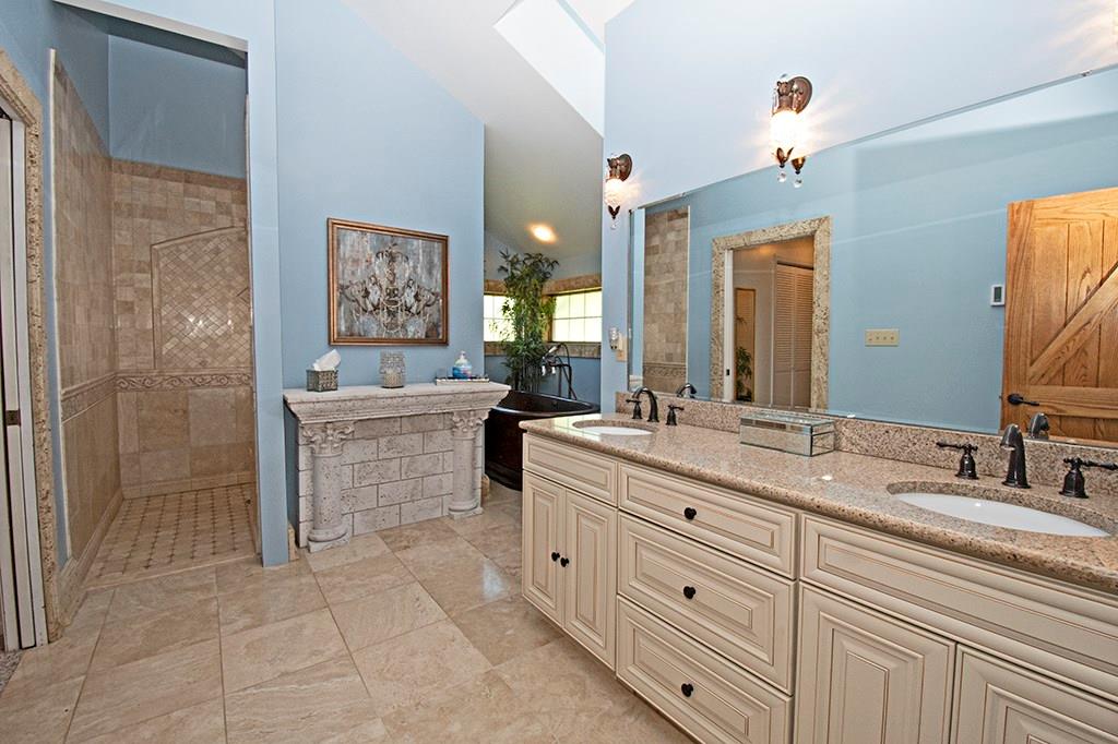 104 Rea Road Avella, PA 15312 - Photo 11 of 25 SUPER-SIZED ROMAN SHOWER TO THE LEFT, HAND HAMMERED COPPER SOAKING TUB AND DOUBLE BOWL SINK COMPLETE THIS MASTER BATH. WATER CLOSET IS SEPARATE.