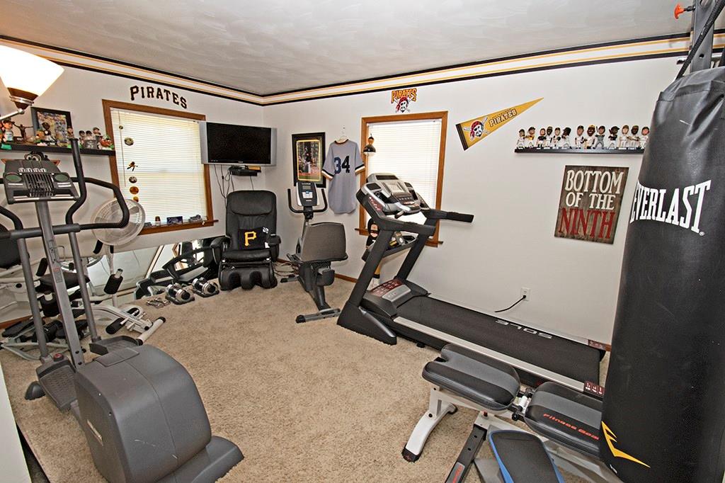 104 Rea Road Avella, PA 15312 - Photo 13 of 25 MAIN FLOOR BEDROOM IS CURRENTLY USED AS AN EXERCISE SPACE.