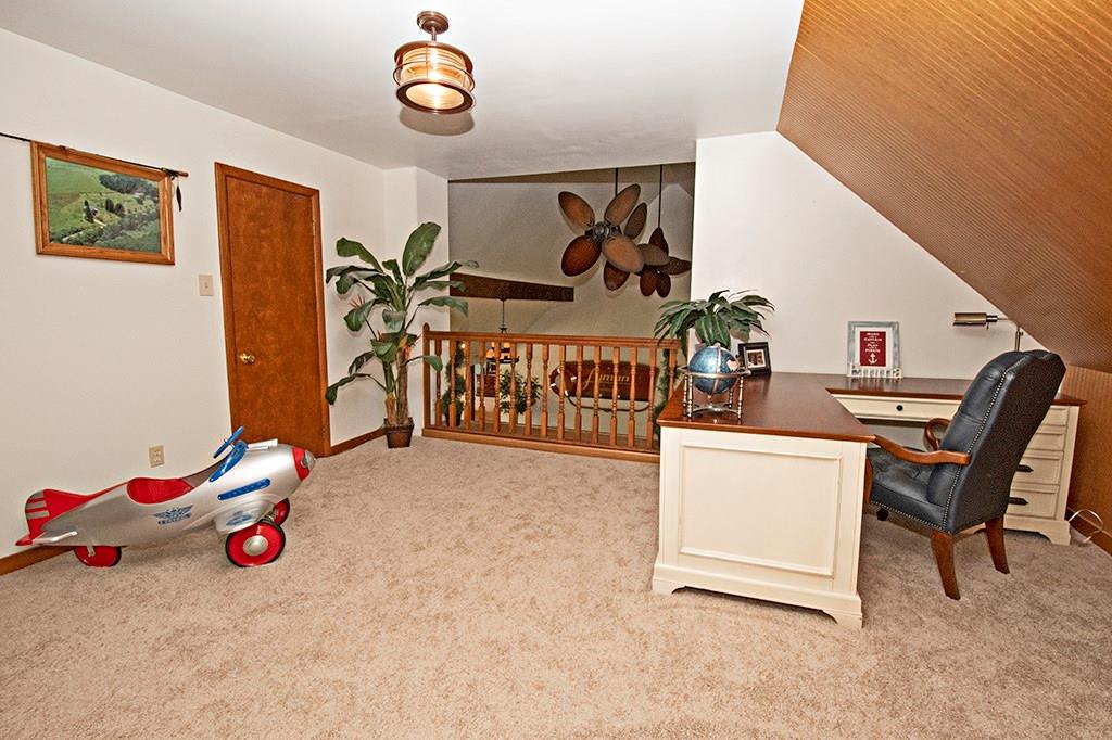 104 Rea Road Avella, PA 15312 - Photo 17 of 25 SPACIOUS LOFT AREA UPSTAIRS. STORAGE AVAILABLE OFF OF LOFT IN 3 AREAS! OPEN TO FAMILY ROOM BELOW.