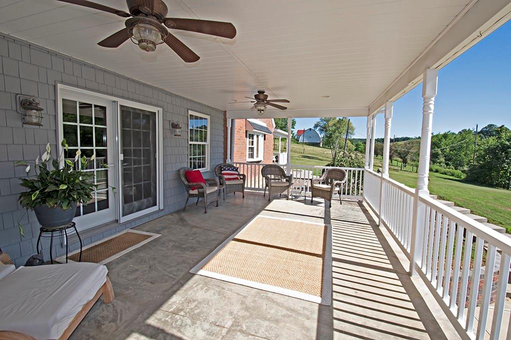 104 Rea Road Avella, PA 15312 - Photo 4 of 25 THIS COVERED FRONT PORCH WITH CEILING FANS WILL NOT DISAPPOINT. THE PERFECT SPOT FOR YOUR MORNING COFFEE!