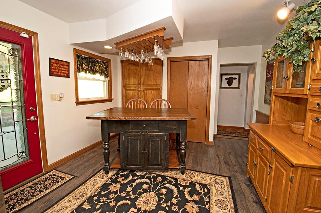 104 Rea Road Avella, PA 15312 - Photo 7 of 25 EAT-IN KITCHEN WITH BUILT IN PANTRY. THE DOOR TO THE LEFT LEADS OUT ONTO THE ENORMOUS BACK COVERED PATIO.