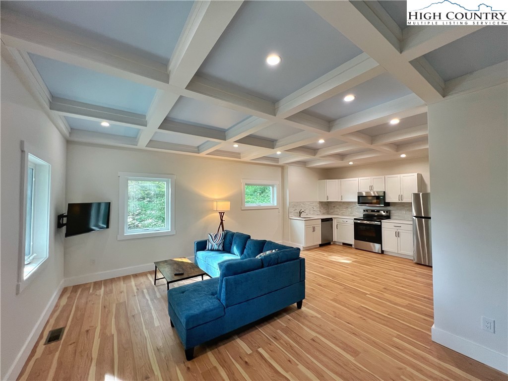 505 Camp Rock Road Boone, NC 28607 - Photo 17 of 31 a living room with furniture and a wooden floor
