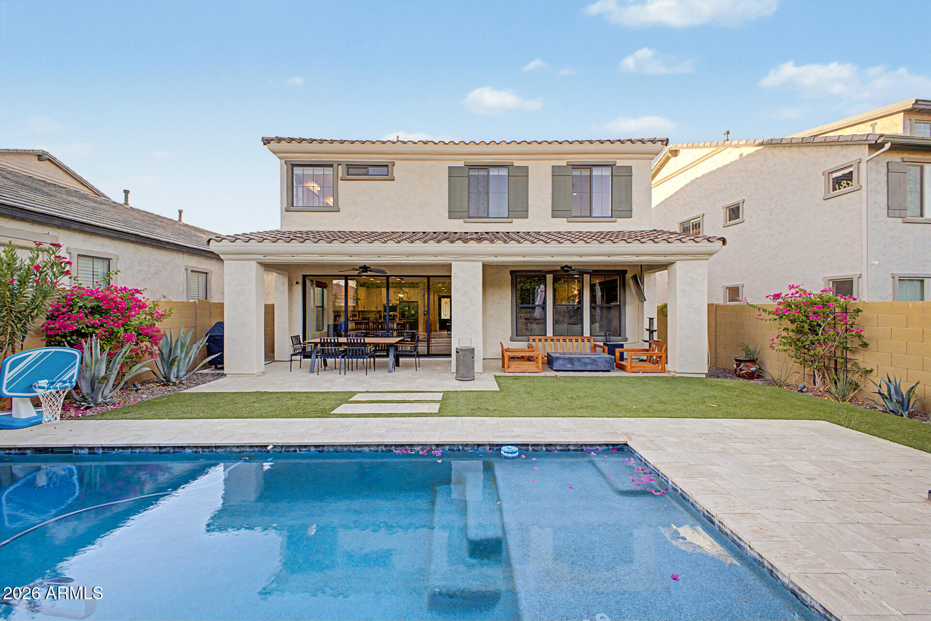 819 West Deer Creek Road Phoenix, AZ 85048 - Photo 74 of 76 a view of a house with sitting area and swimming pool