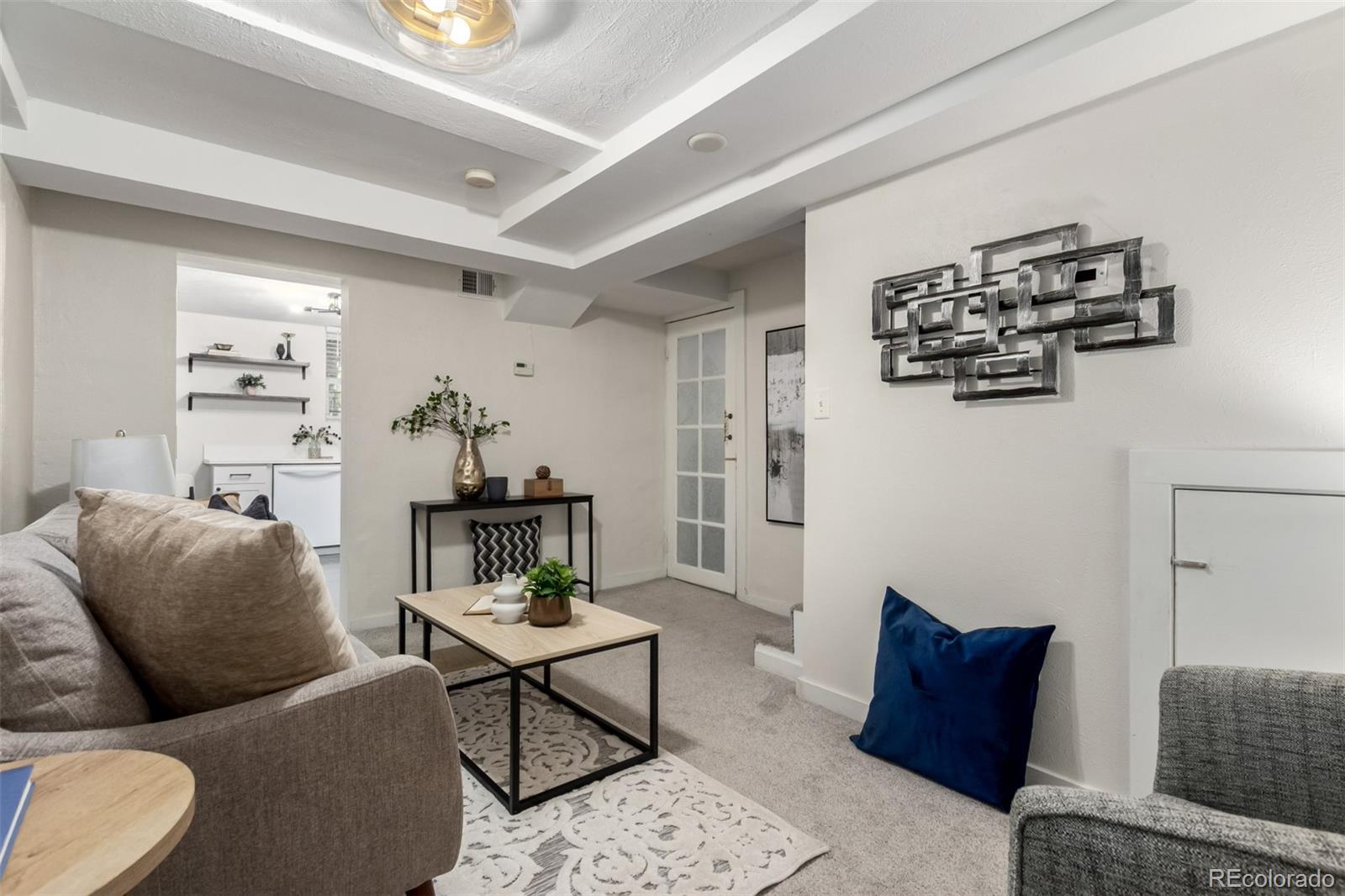 1284 Columbine Street, Unit 2 Denver, CO 80206 - Photo 11 of 34 a living room with furniture and wooden floor