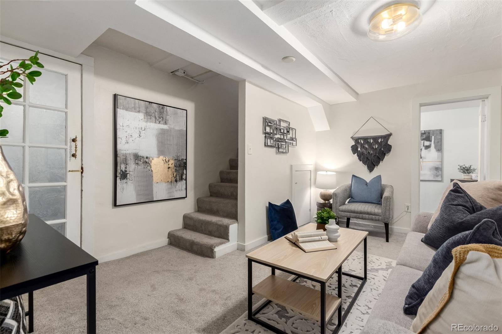 1284 Columbine Street, Unit 2 Denver, CO 80206 - Photo 12 of 34 a living room with furniture and wooden floor
