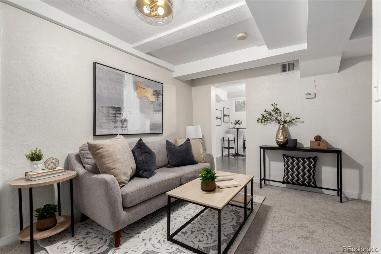 1284 Columbine Street, Unit 2 Denver, CO 80206 - Photo 2 of 34 a living room with furniture and wooden floor