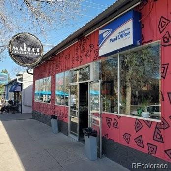1284 Columbine Street, Unit 2 Denver, CO 80206 - Photo 28 of 34 an outdoor cafe with a table and chairs
