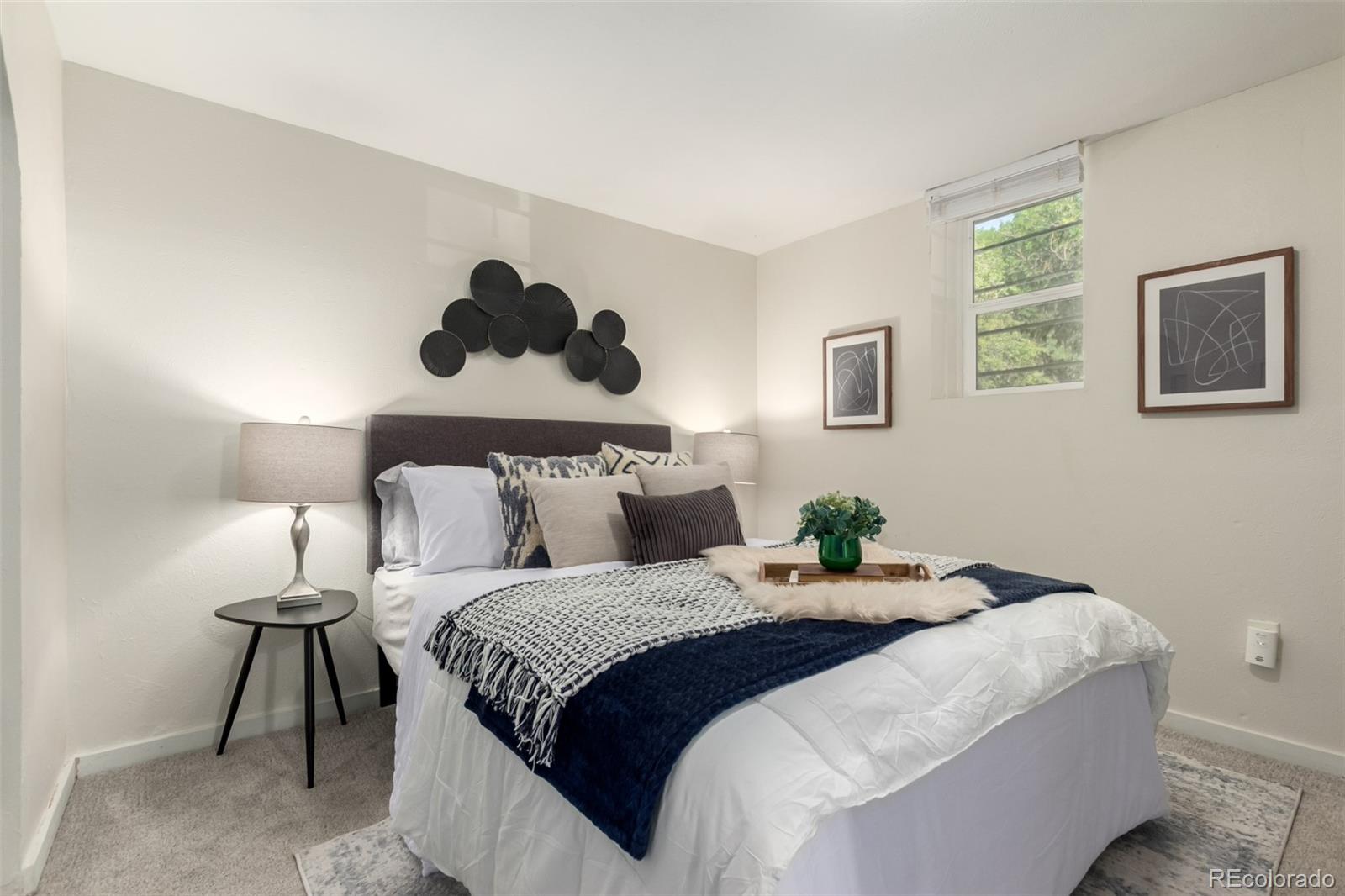 1284 Columbine Street, Unit 2 Denver, CO 80206 - Photo 9 of 34 a bedroom with a bed and window