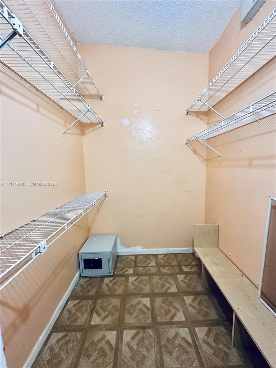 13465 Southwest 62nd Street, Unit 4 Miami, FL 33183 - Photo 14 of 20 Main Bedroom Walk-in Closet