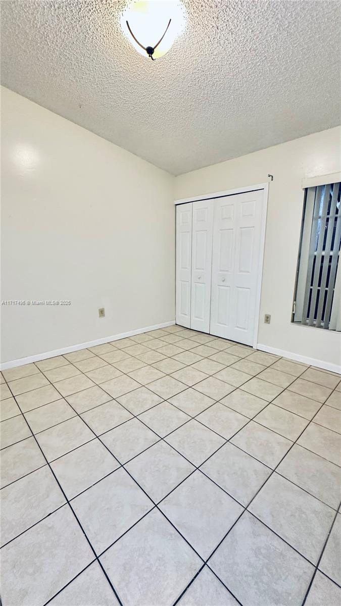 13465 Southwest 62nd Street, Unit 4 Miami, FL 33183 - Photo 15 of 20 2nd Bedroom