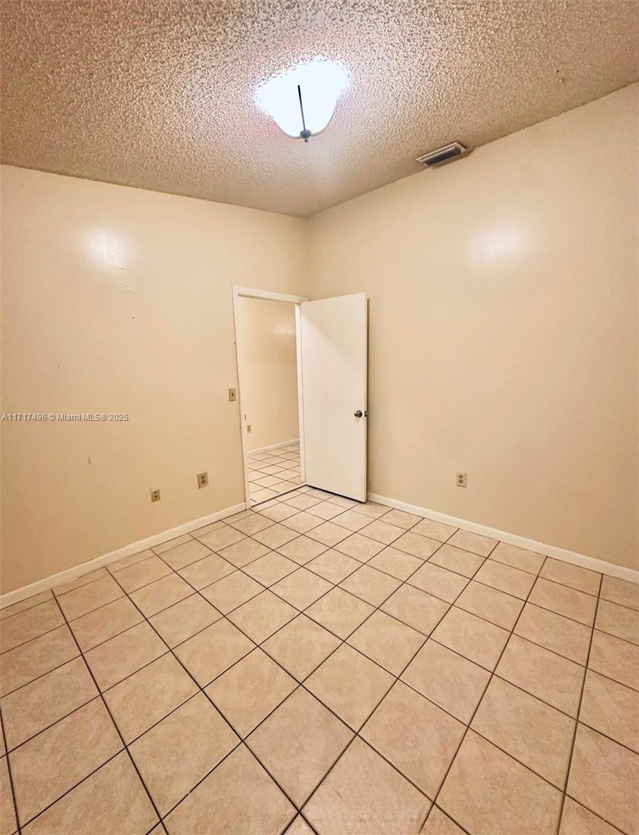 13465 Southwest 62nd Street, Unit 4 Miami, FL 33183 - Photo 16 of 20 2nd Bedroom