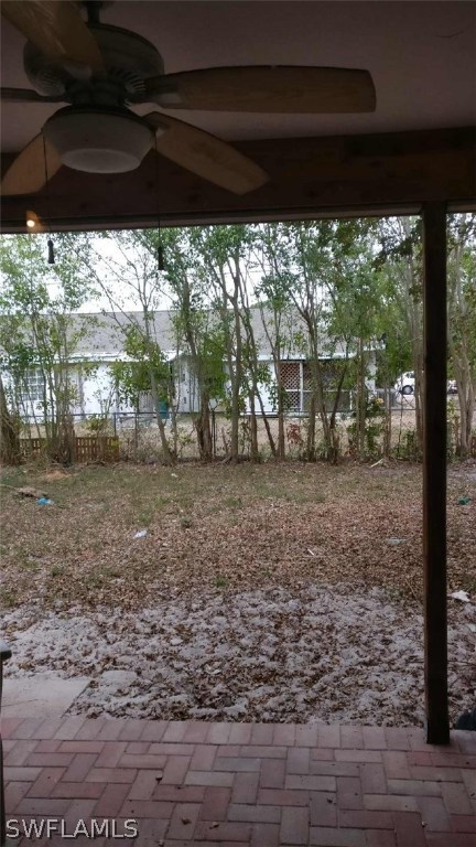 7489 Pebble Beach Road Fort Myers, FL 33967 - Photo 7 of 7 a view of a yard with porch and outdoor space