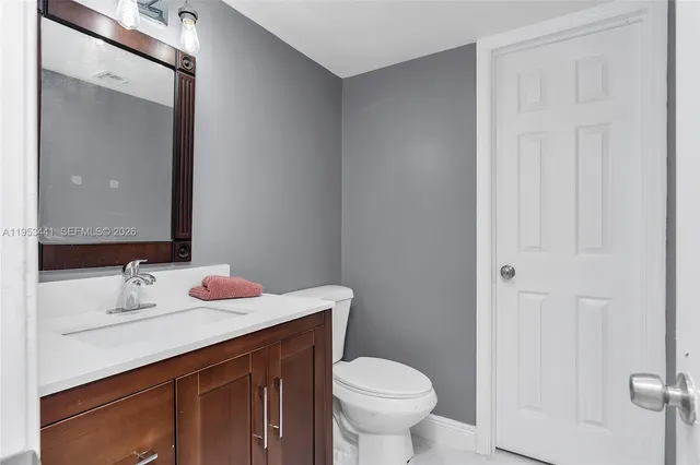 a bathroom with a sink and a toilet
