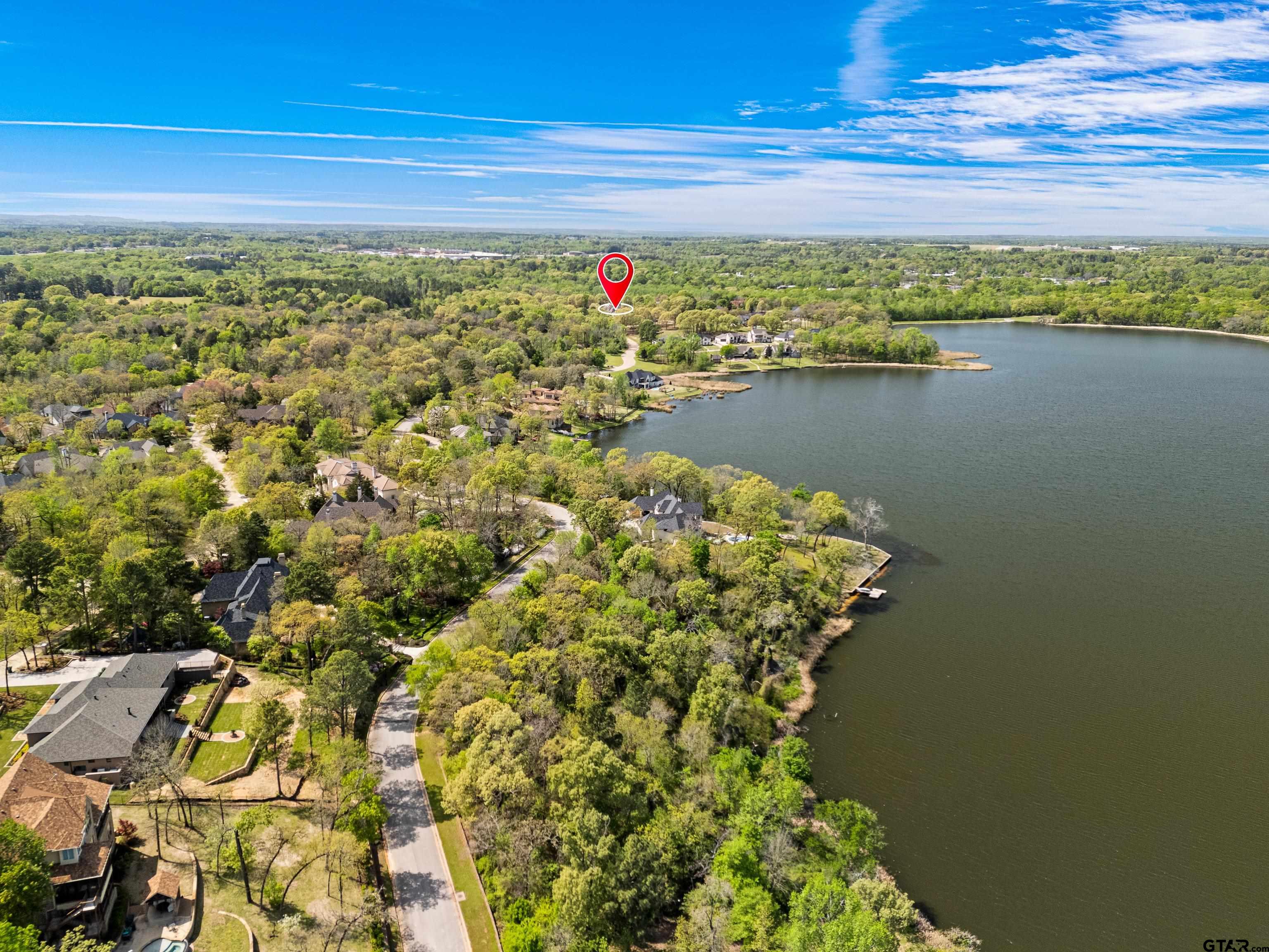 4856 Nicklaus Court Tyler, TX 75709 - Photo 15 of 32 a view of a lake