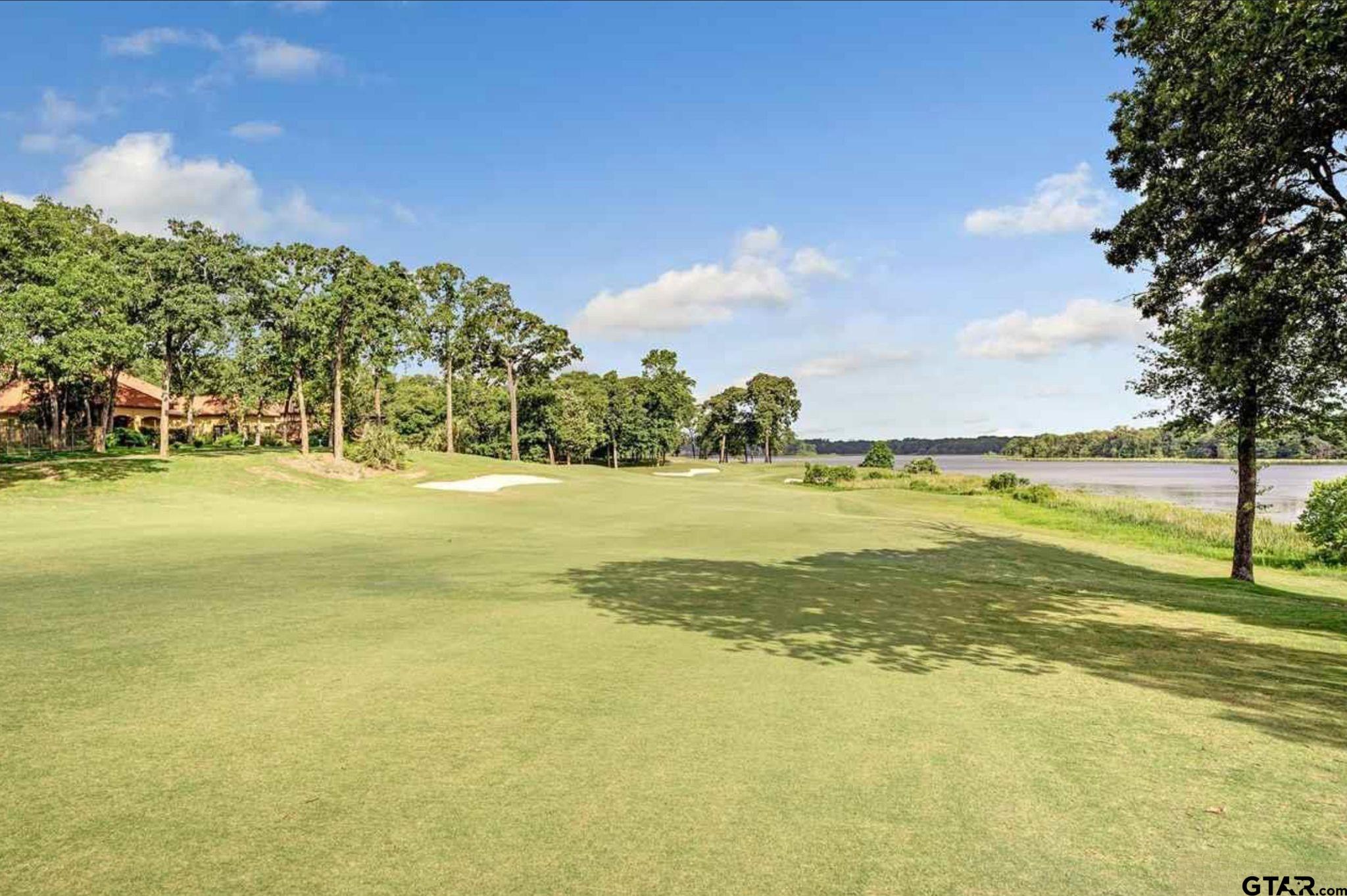 4856 Nicklaus Court Tyler, TX 75709 - Photo 29 of 32 a view of an ocean and beach