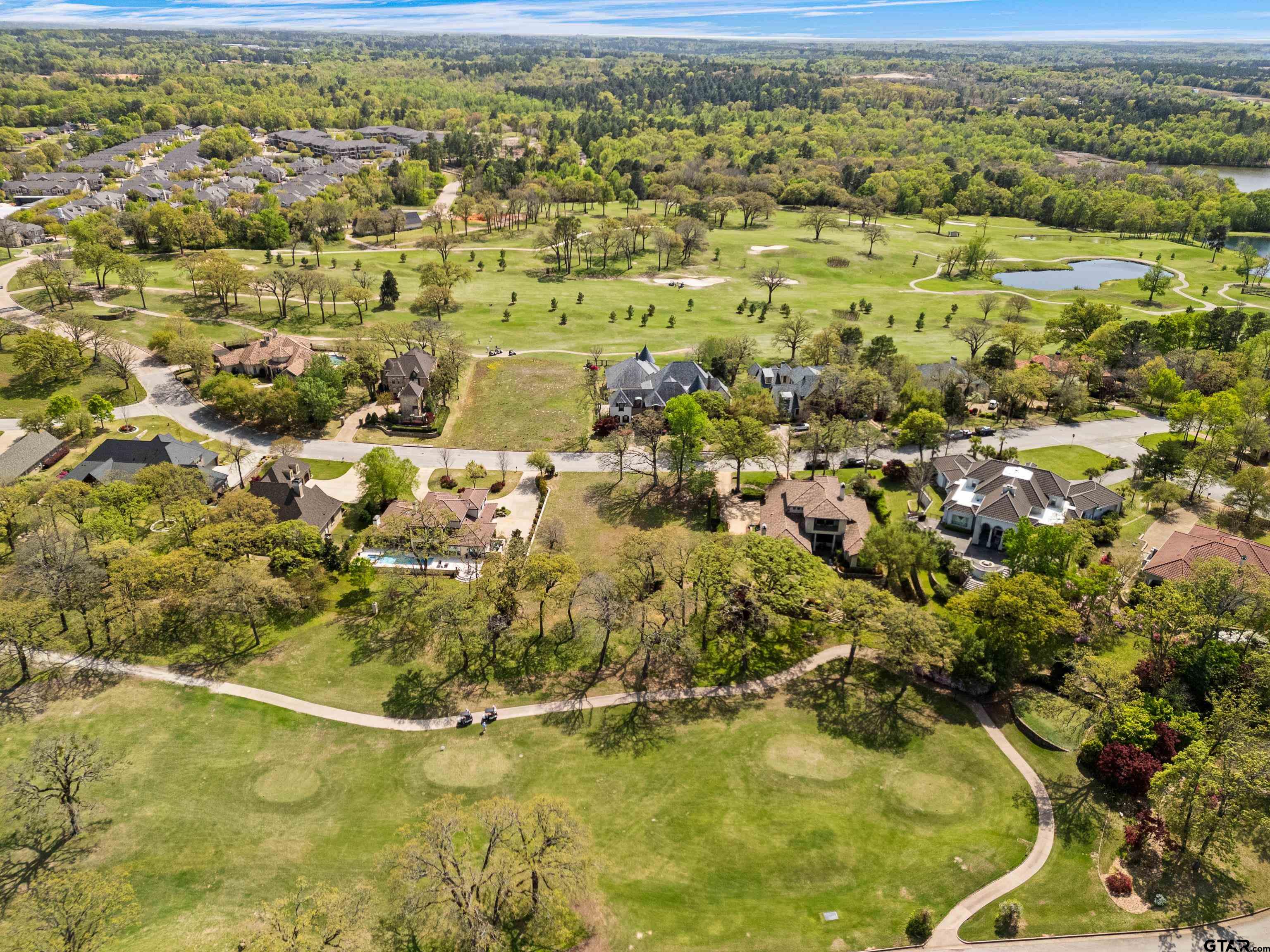 4856 Nicklaus Court Tyler, TX 75709 - Photo 8 of 32 a view of residential houses with outdoor space