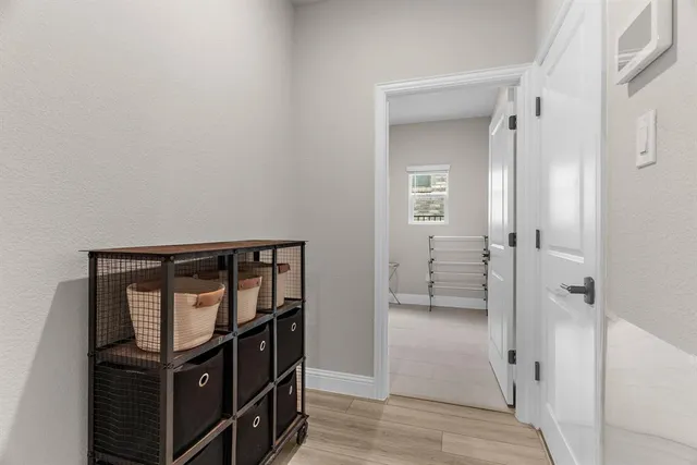 a view of a hallway with elevator