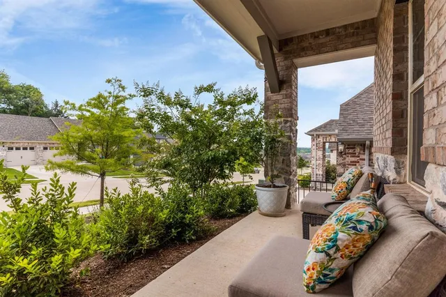 a view of a chairs and table in a patio