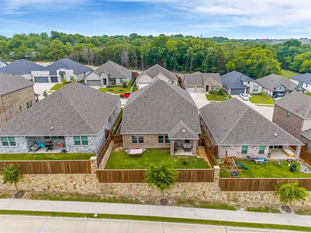 an aerial view of a house with a garden view