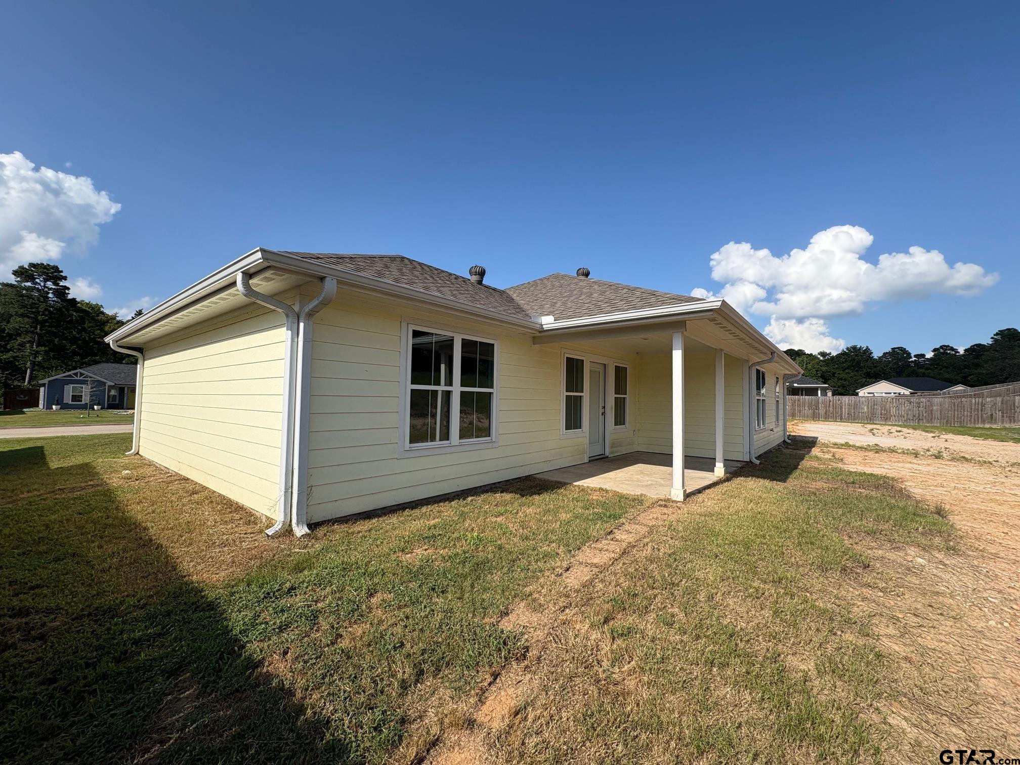 148 Brenlind Lane Mineola, TX 75773 - Photo 5 of 6 a view of a house with a yard
