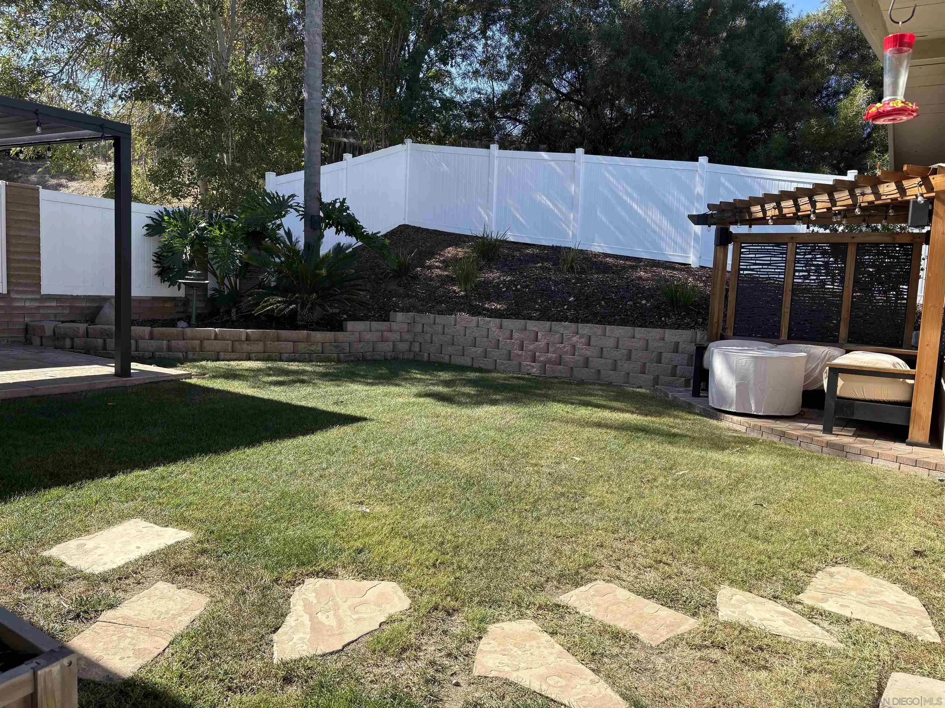 4160 Yale Avenue La Mesa, CA 91941 - Photo 17 of 18 a view of a backyard with plants and patio