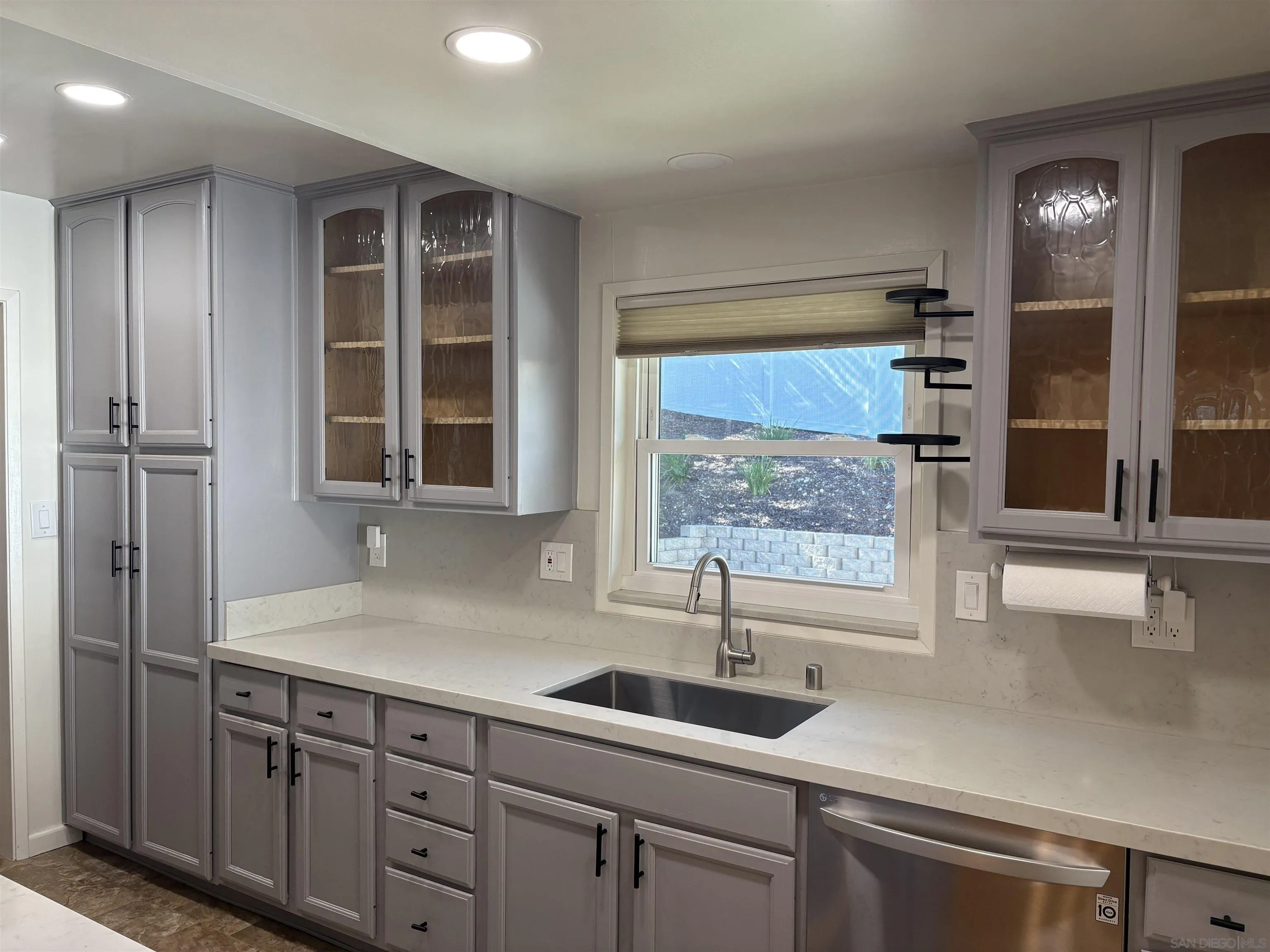 4160 Yale Avenue La Mesa, CA 91941 - Photo 5 of 18 a kitchen with a sink and large window