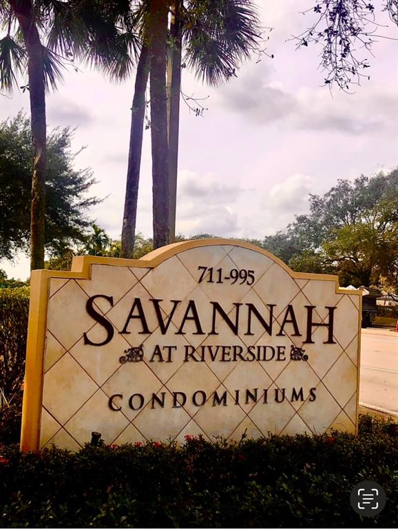 a view of a park with an ocean view