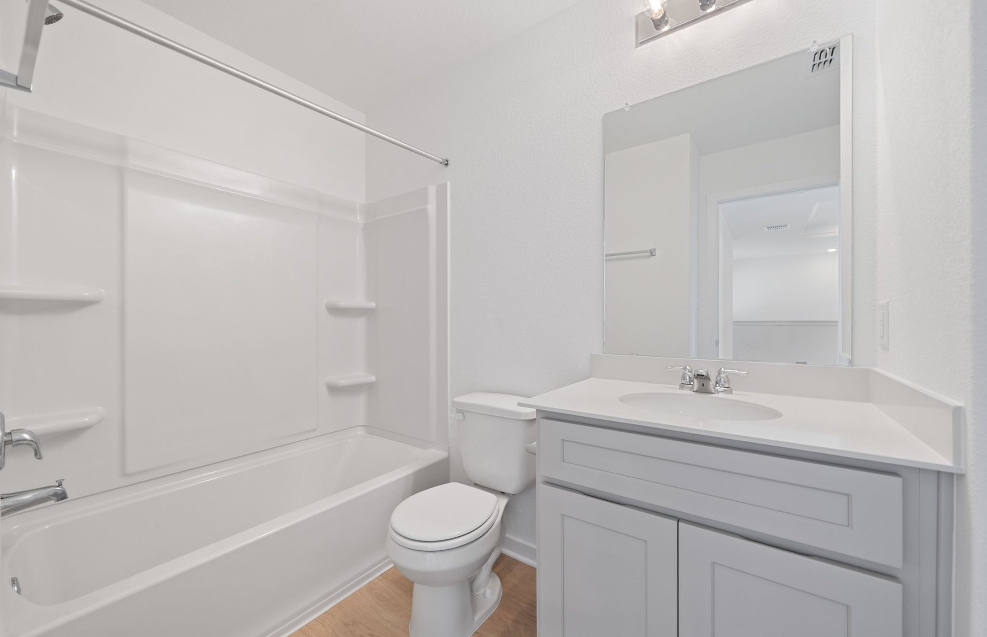 608 Rubber Tree Way Buda, TX 78610 - Photo 21 of 29 a bathroom with a sink a toilet and shower