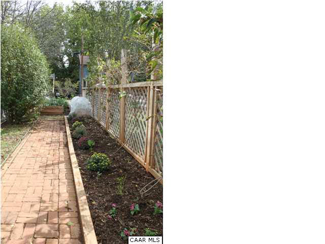 129 Goodman Street Charlottesville, VA 22902 - Photo 21 of 25 a picture of a person on a sidewalk