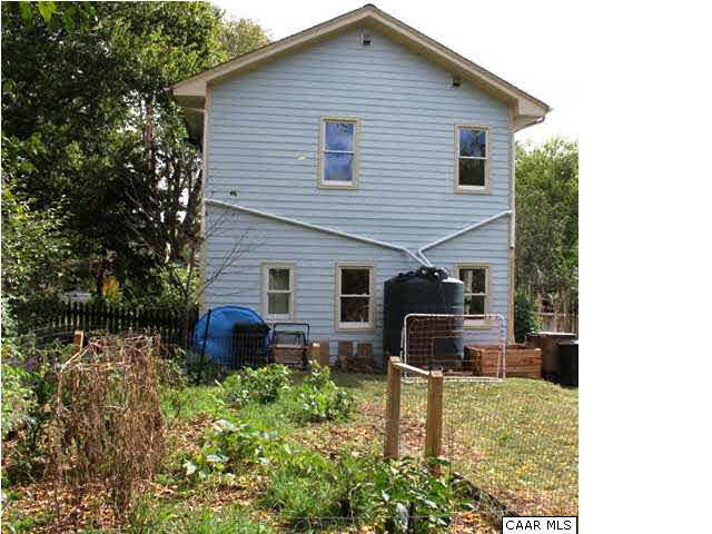 129 Goodman Street Charlottesville, VA 22902 - Photo 23 of 25 a backyard of a house with seating space