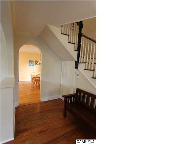 129 Goodman Street Charlottesville, VA 22902 - Photo 3 of 25 a view of entryway and hall with wooden floor