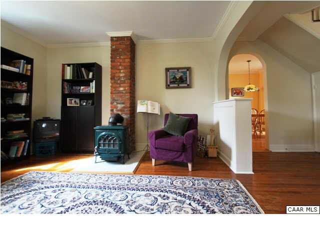 129 Goodman Street Charlottesville, VA 22902 - Photo 6 of 25 a living room with furniture rug and window