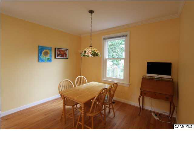 129 Goodman Street Charlottesville, VA 22902 - Photo 9 of 25 a dining room with furniture and window
