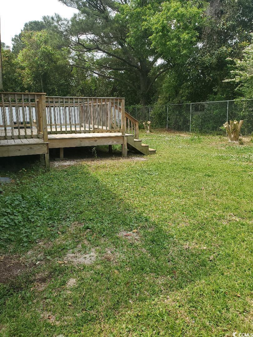 615 Burcale Rd Circle Myrtle Beach, SC 29579 - Photo 17 of 17 View of yard featuring fence and a deck