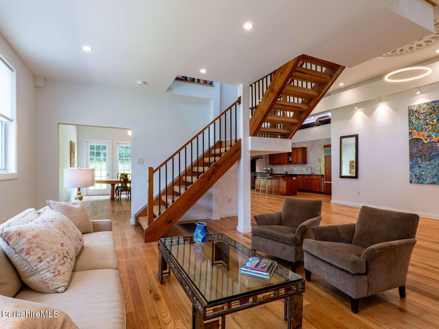 160 High Street Lee, MA 01238 - Photo 17 of 41 a living room with furniture or stairs and a wooden floor