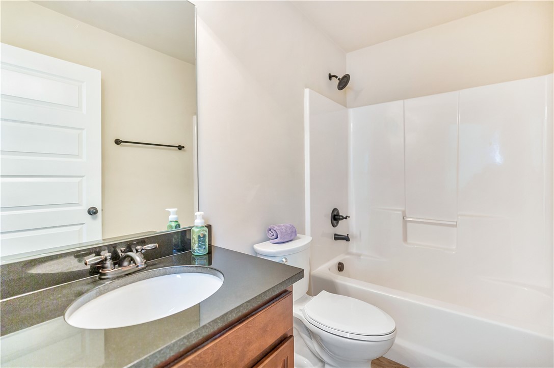 144 Buckland Drive Anderson, SC 29621 - Photo 16 of 48 Refined bathroom with a tub-shower combination, modern fixtures, and ample vanity space.