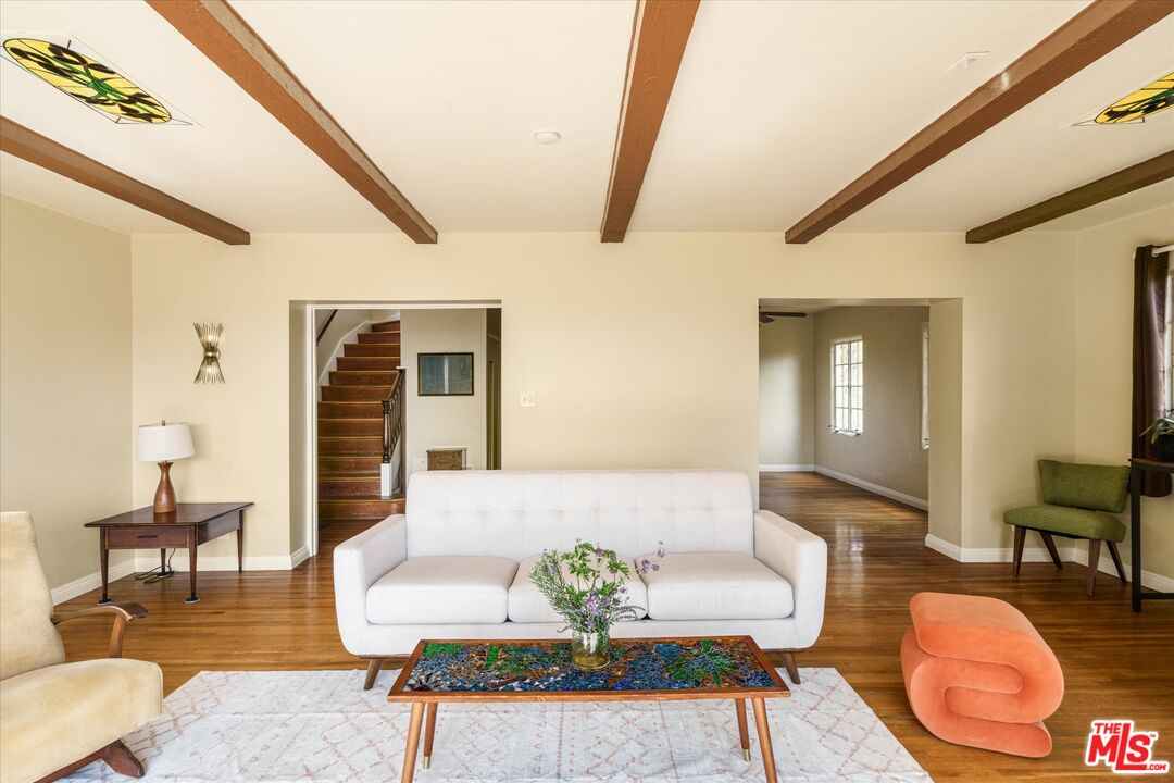 11111 Tujunga Canyon Boulevard Tujunga, CA 91042 - Photo 12 of 38 a living room with furniture and wooden floor