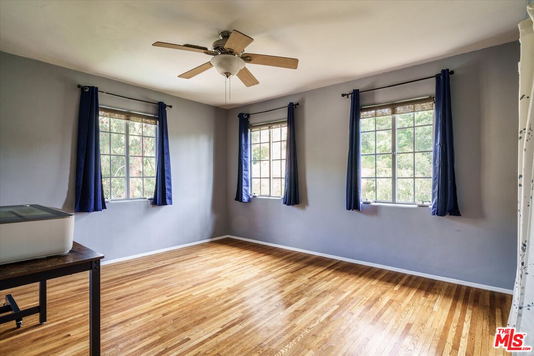 11111 Tujunga Canyon Boulevard Tujunga, CA 91042 - Photo 24 of 38 a view of an empty room with a window