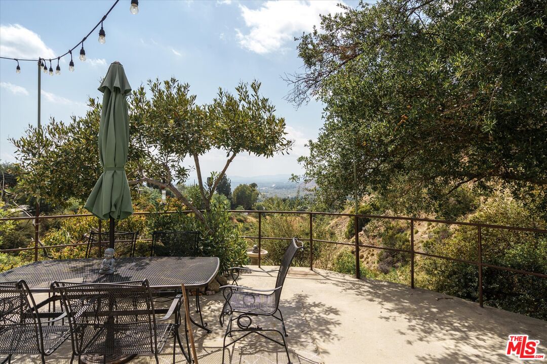 11111 Tujunga Canyon Boulevard Tujunga, CA 91042 - Photo 30 of 38 a view of a chairs and table in patio