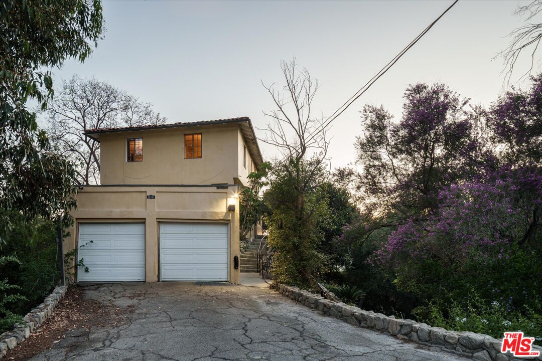 11111 Tujunga Canyon Boulevard Tujunga, CA 91042 - Photo 5 of 38 a front view of house with yard