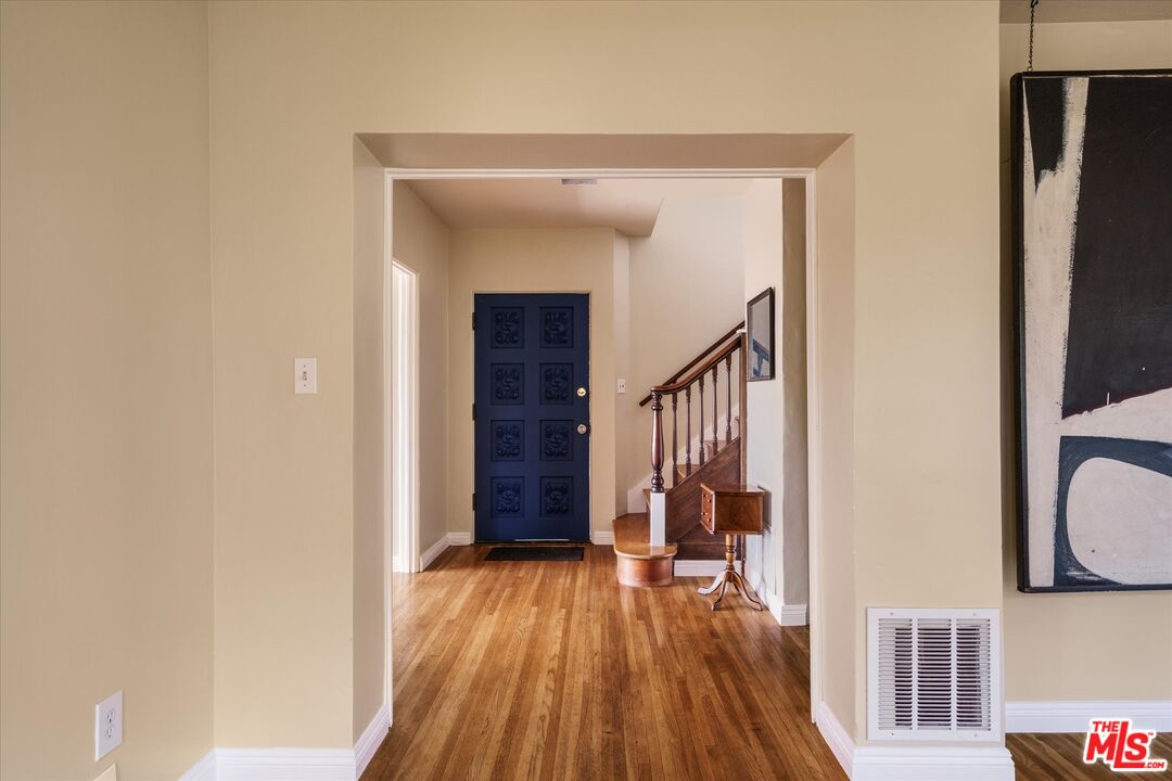 11111 Tujunga Canyon Boulevard Tujunga, CA 91042 - Photo 7 of 38 a view of hallway with wooden floor