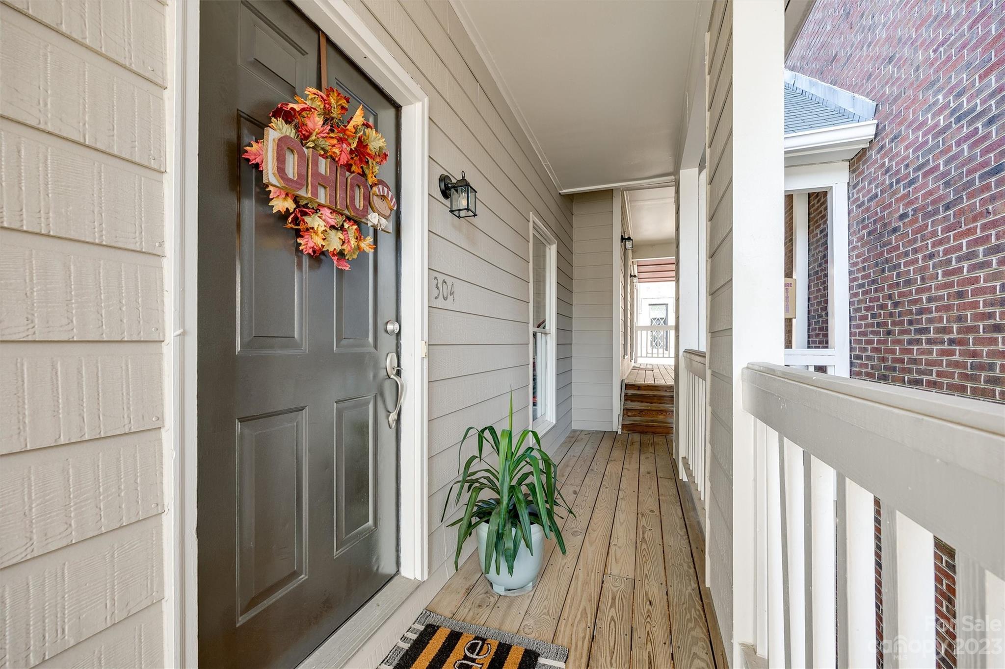 301 Queens Road, Unit 304 Charlotte, NC 28204 - Photo 2 of 26 a view of a entryway door front of house