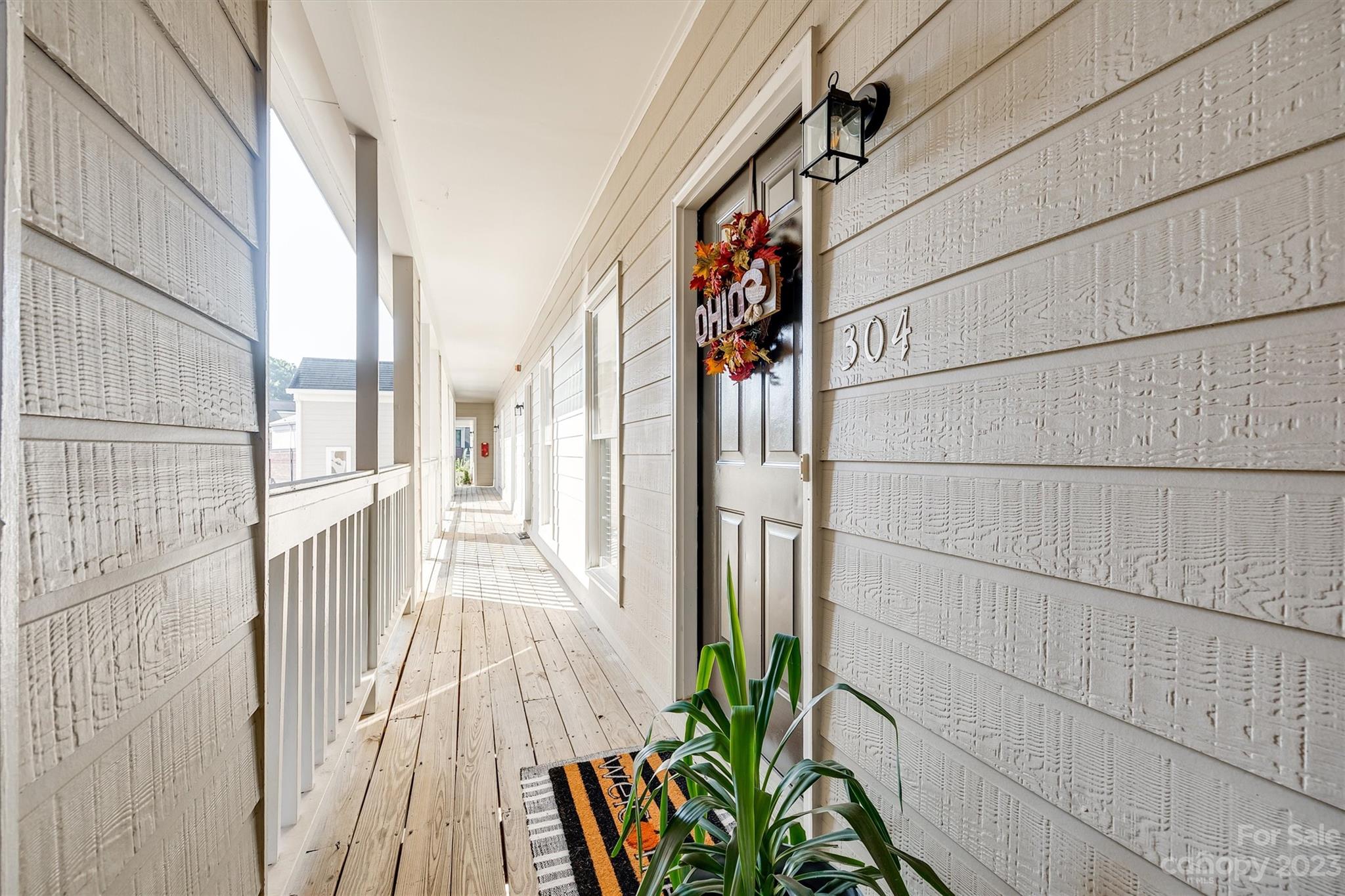 301 Queens Road, Unit 304 Charlotte, NC 28204 - Photo 3 of 26 a view of a pathway of a house